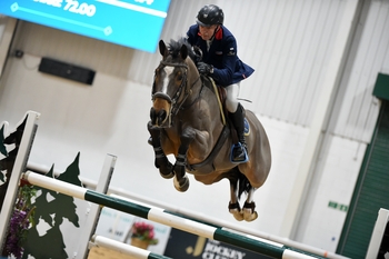 John Whitaker powers to victory in the Winter Grand Prix with Sharid at Aintree Equestrian Centre’s Winter Classic II